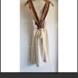 Just fab NWT ivory and gold sequined cross back